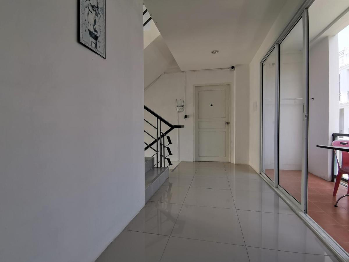 Sure Guesthouse Pantai Kamala Bagian luar foto